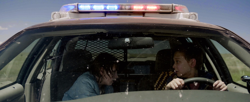 two-kids-take-a-traumatic-joy-ride-in-cop-car-sundance-2015-review