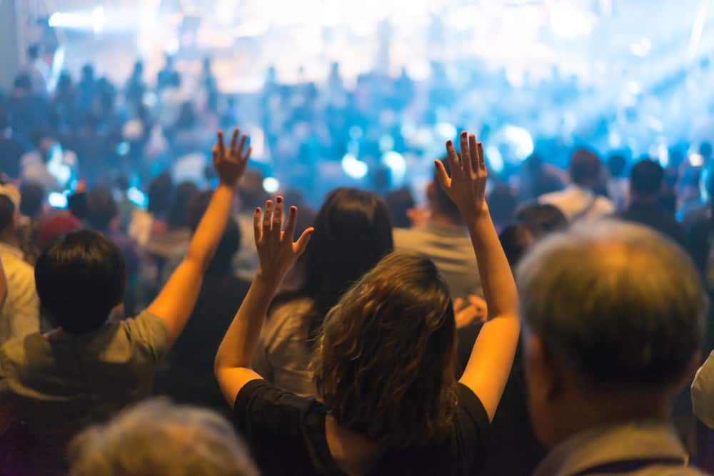 This is a close look at a Christian worship concert.