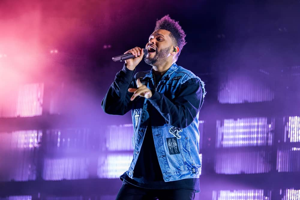 The Weeknd performing on stage in Spain at an event.