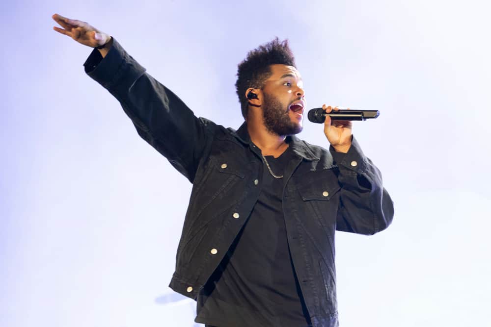 The Weeknd performing on stage at Cntral Park event.