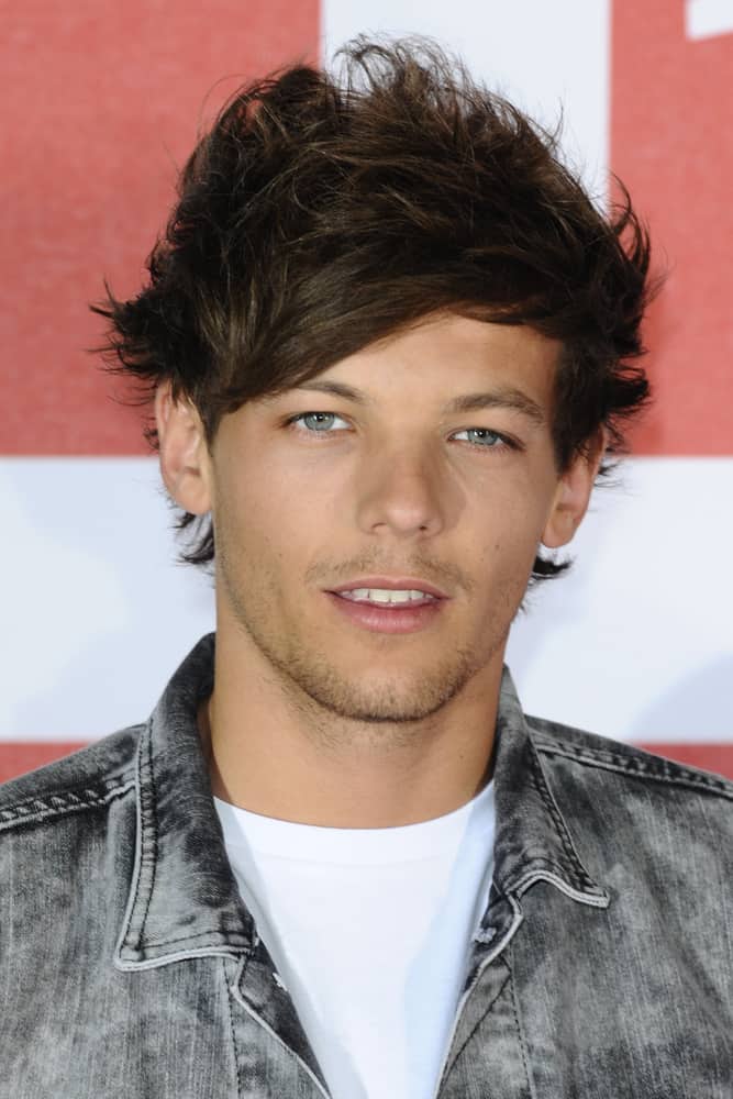 Louis Tomlinson attended the 2013 movie premiere of This is Us.